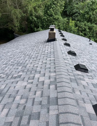 new roof installation with grey shingles