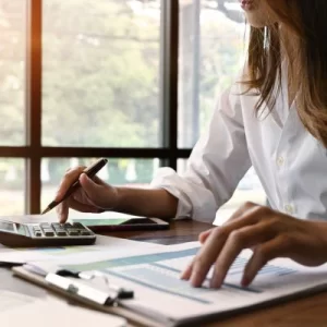 Woman calculating a budget