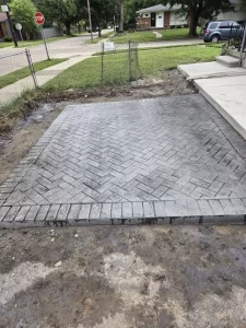 Decorative stamped concrete Back Patio installation in Brownstown 