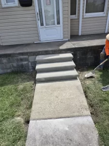 Tittle.Brownstown.Masonry.Steps. Concrete Steps installed on a residential home in Brownstown