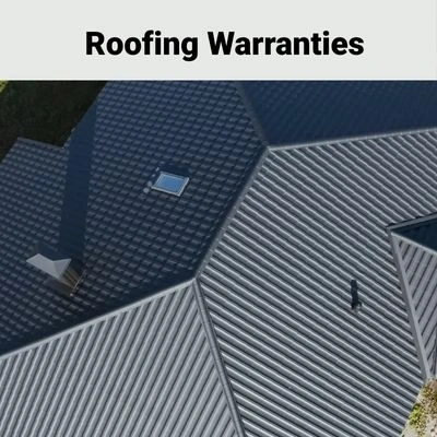 roofing-warranty-guide Aerial view of a residential home with a newly replaced shingle roof