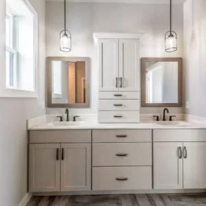 Contemporary bathroom with double vanity, pendant lighting, and wood-framed mirrors