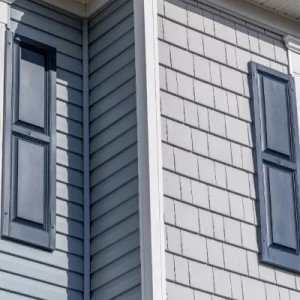 fiber-cement-siding Close-up of siding on Michigan home exterior with matching shutters